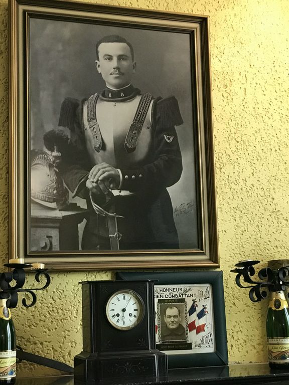 Léon Giraud, WWI soldier and grandfather of the innkeeper's husband. His portrait is featured on the house champagne